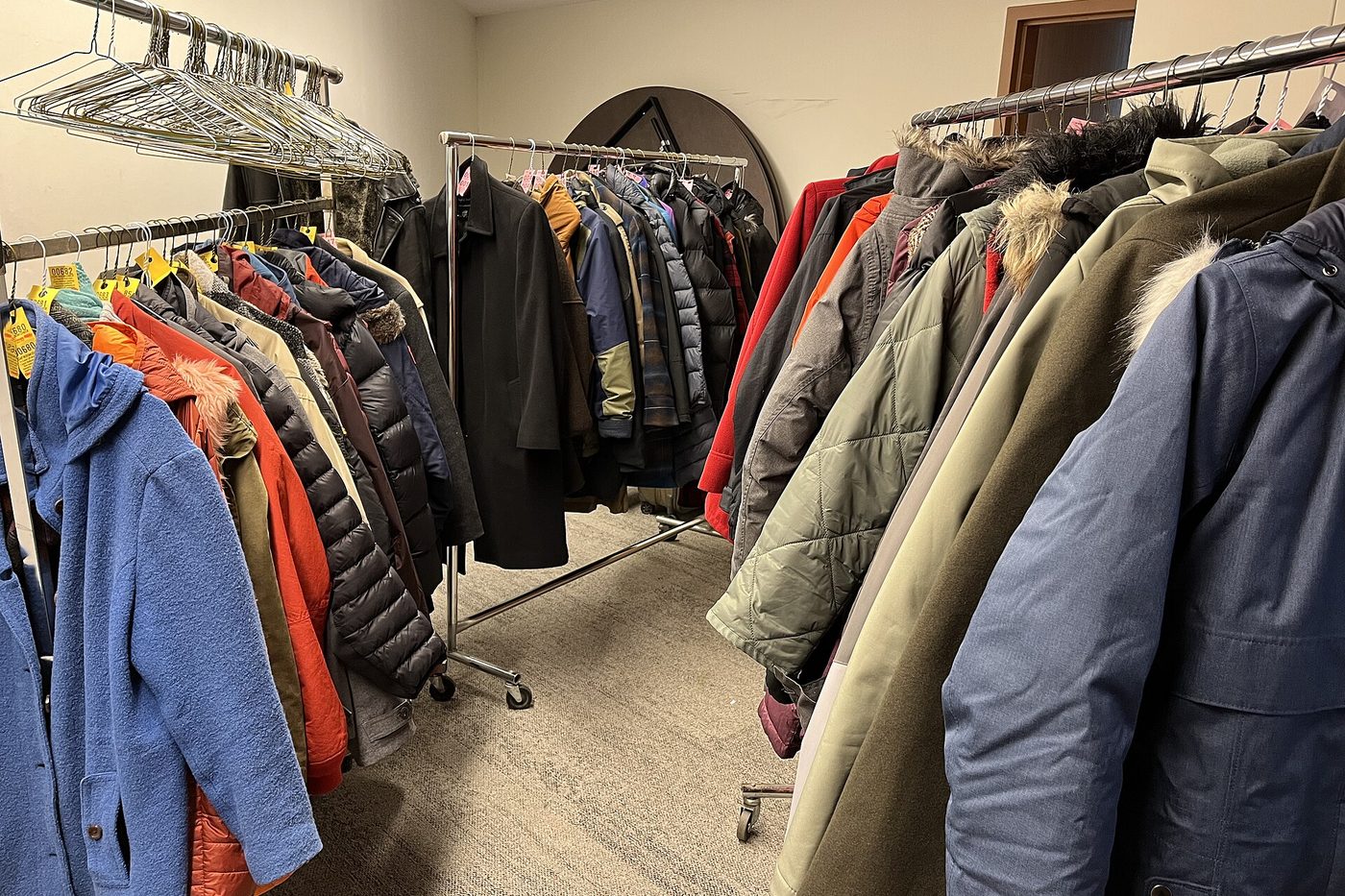 Racks full of coats and jackets in a cloakroom