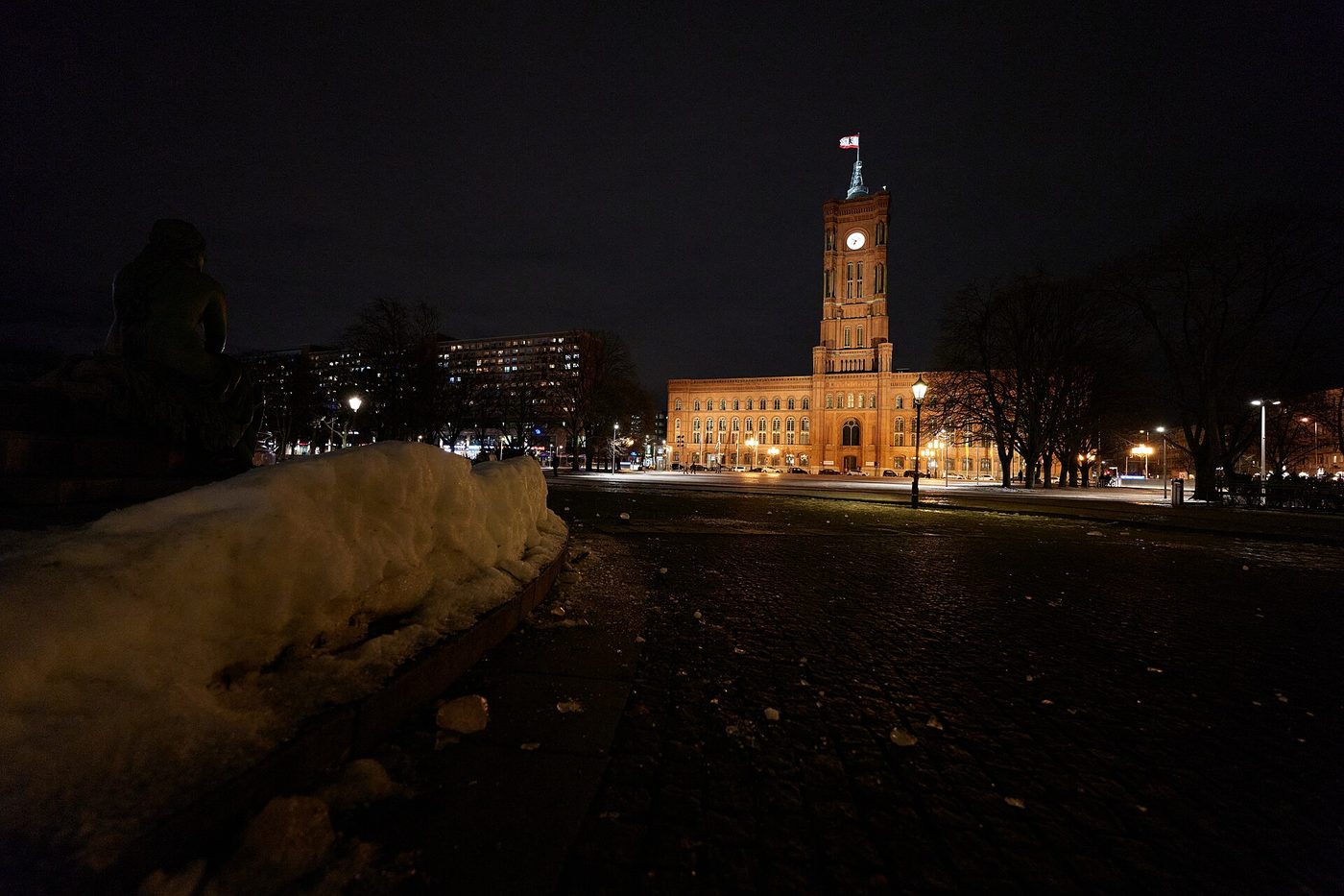 Berlin’s Rotes Rathaus at night, its clock tower lit